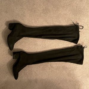 Thigh high black boots